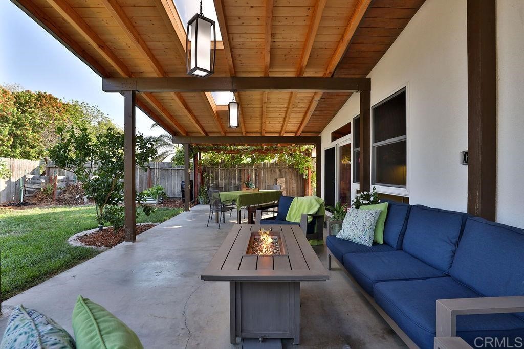 3573 Chasewood Drive San Diego, CA 92111 - Photo 33 of 57 a outdoor living space with furniture and garden view