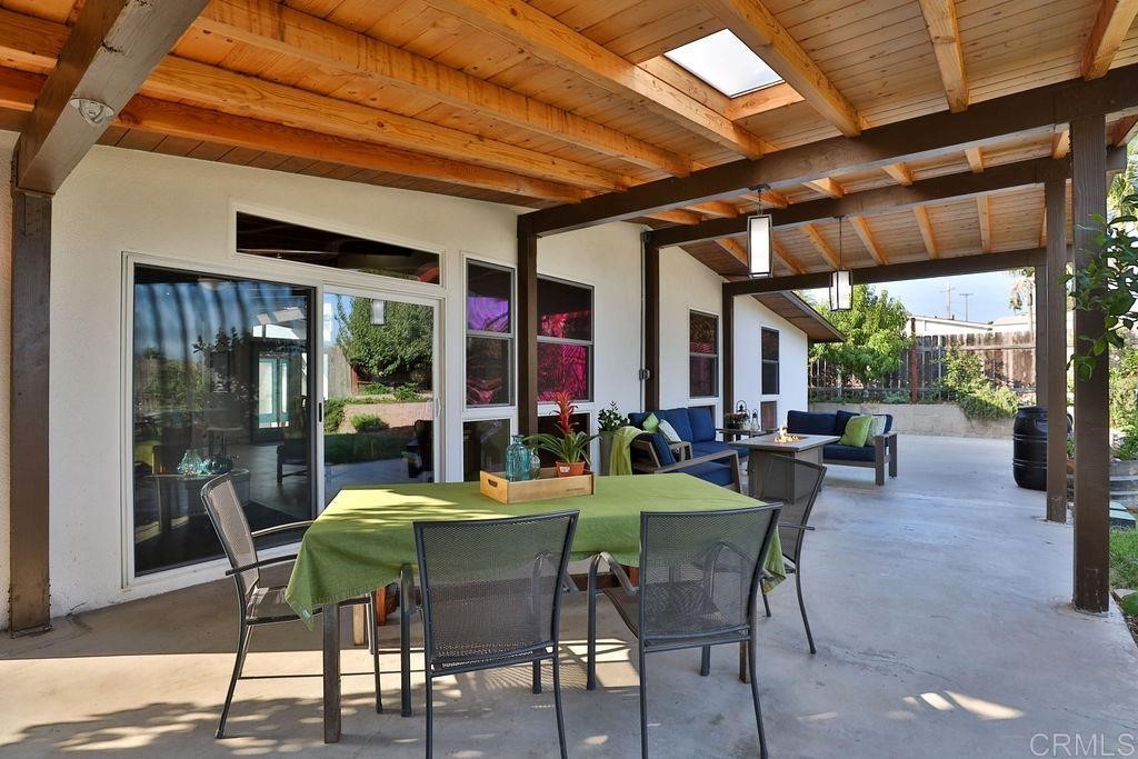 3573 Chasewood Drive San Diego, CA 92111 - Photo 34 of 57 a view of a dining room with furniture window and outside view