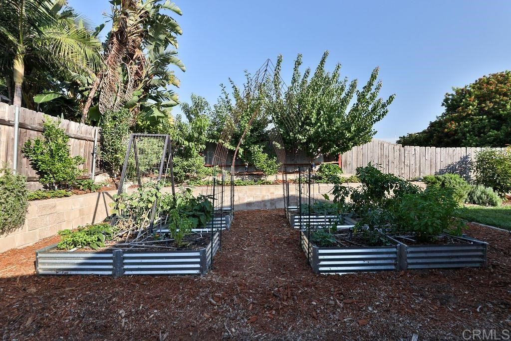 3573 Chasewood Drive San Diego, CA 92111 - Photo 44 of 57 a view of a bench in a garden