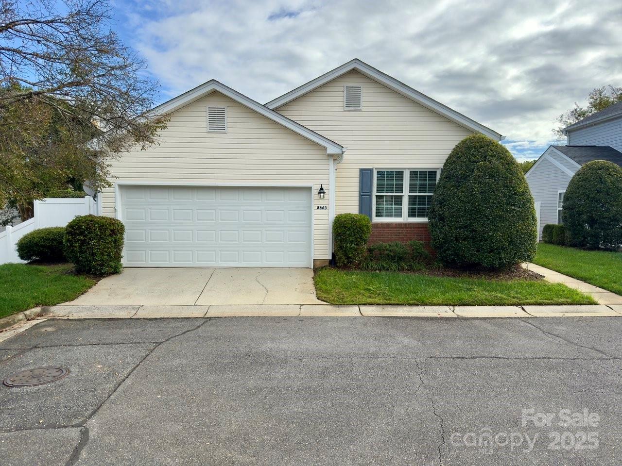 8663 Meadowmont View Drive Charlotte, NC 28269 - Photo 30 of 30 a view of backyard of garage and plants