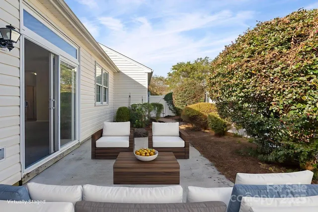 a view of house with yard