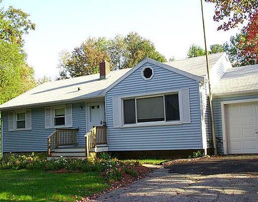 307 Cross Hill Road Monroe, CT 06468 - Photo 1 of 1 a front view of a house with a yard
