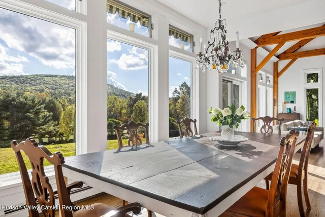 a living room with a couch and a window