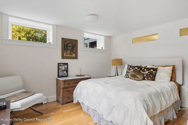 a view of an outdoor sitting area with furniture and umbrella
