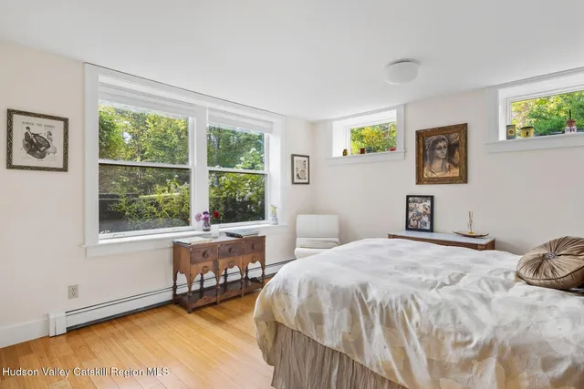 a view of a chairs and table on the balcony