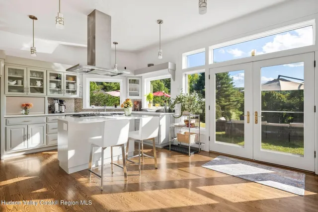 a living room with fireplace furniture and a flat screen tv