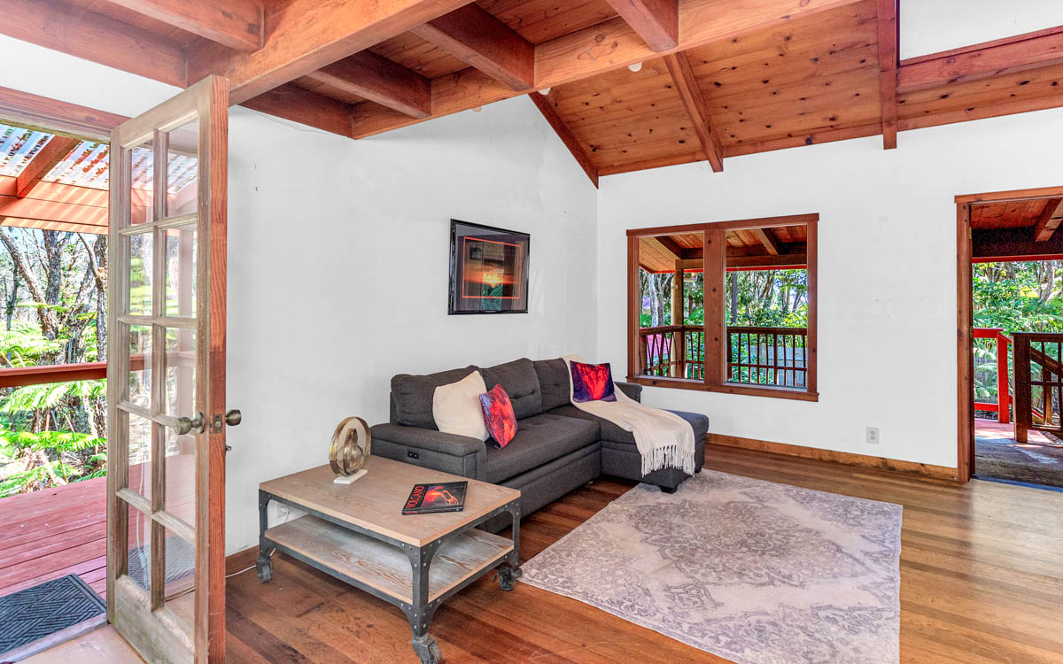 19-3976 John A Lee Road Volcano, HI 96785 - Photo 14 of 30 a living room with furniture and a window