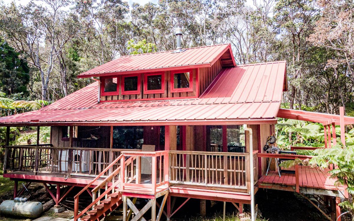 19-3976 John A Lee Road Volcano, HI 96785 - Photo 10 of 30 a front view of a house with a porch
