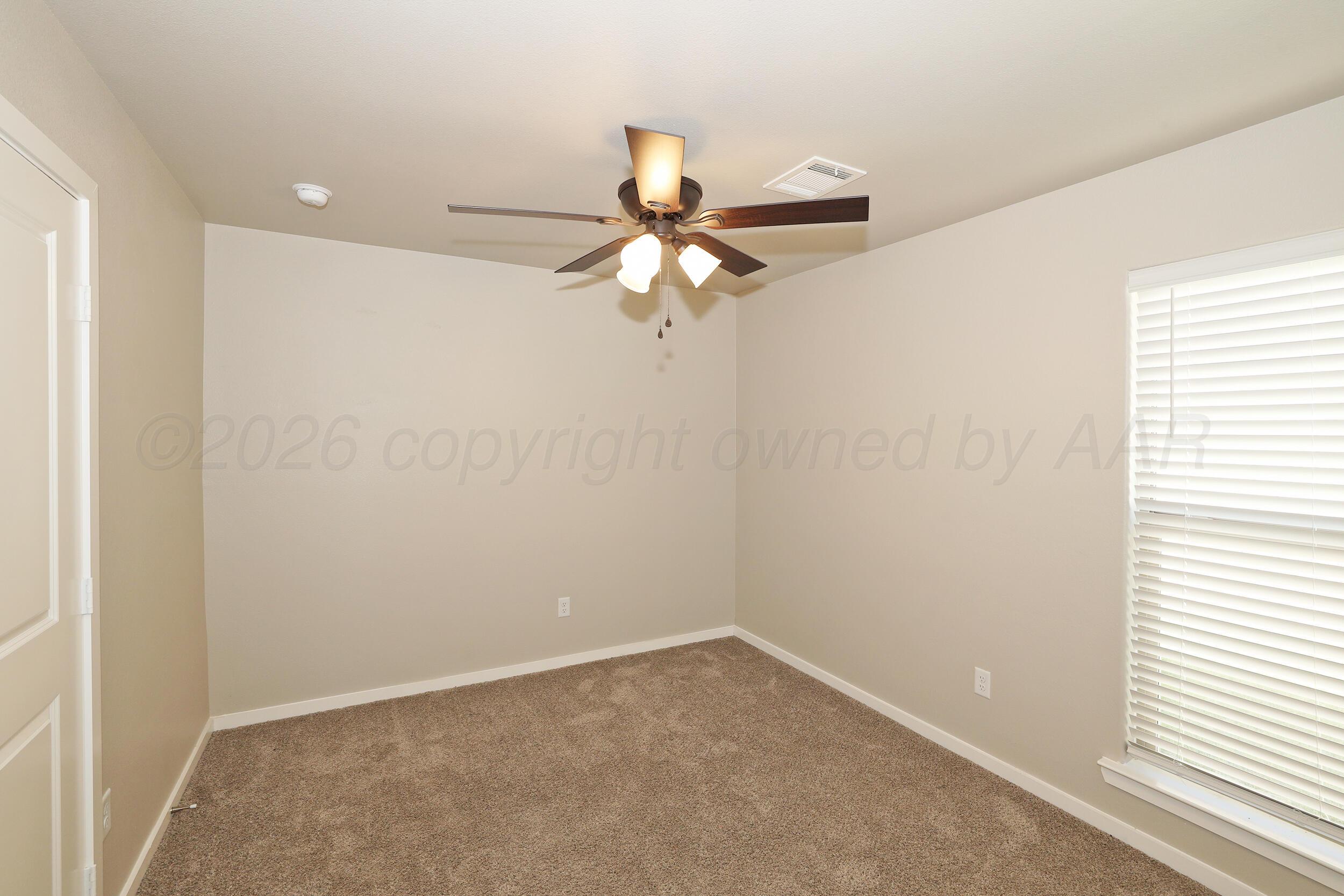 7205 Athens Street Amarillo, TX 79118 - Photo 11 of 25 a view of a small space with a window