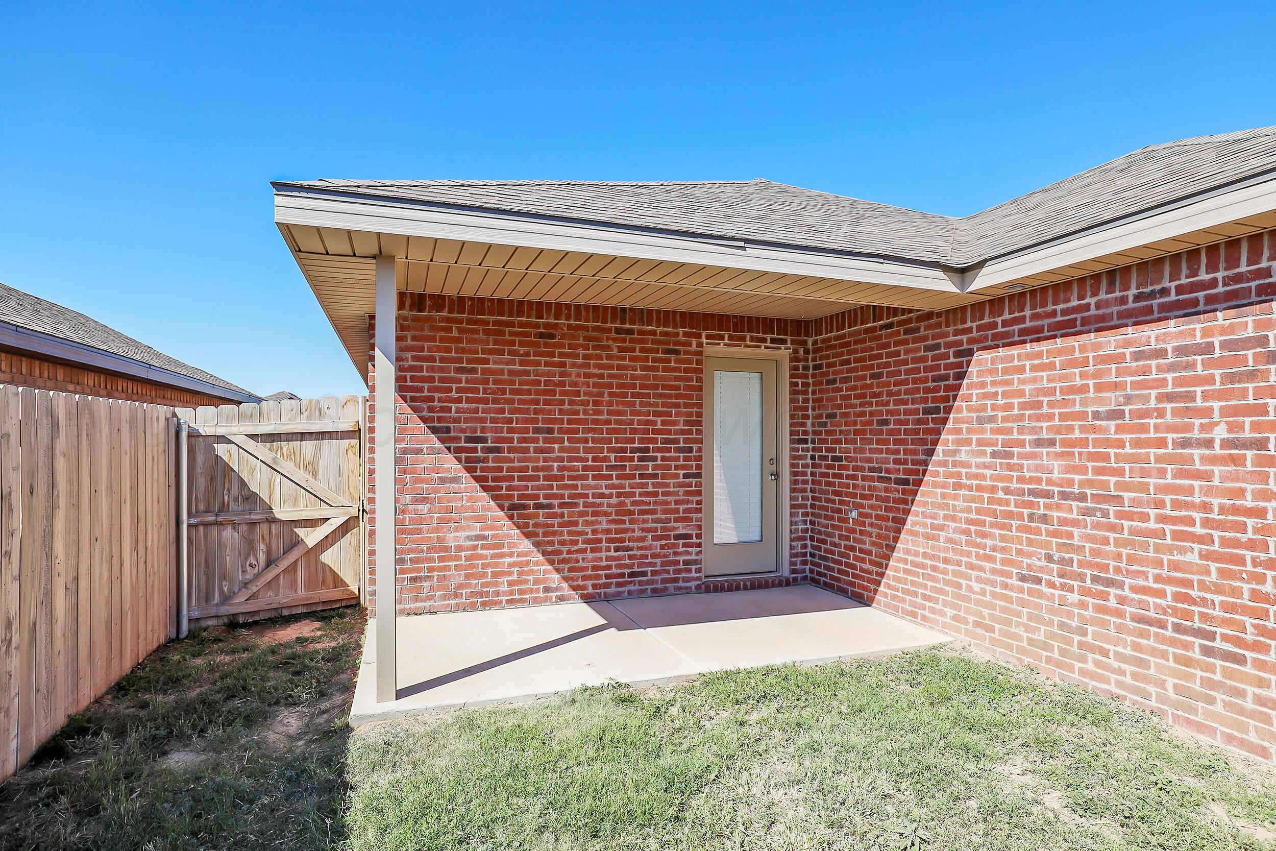 7205 Athens Street Amarillo, TX 79118 - Photo 18 of 25 a view of a house with a staircase