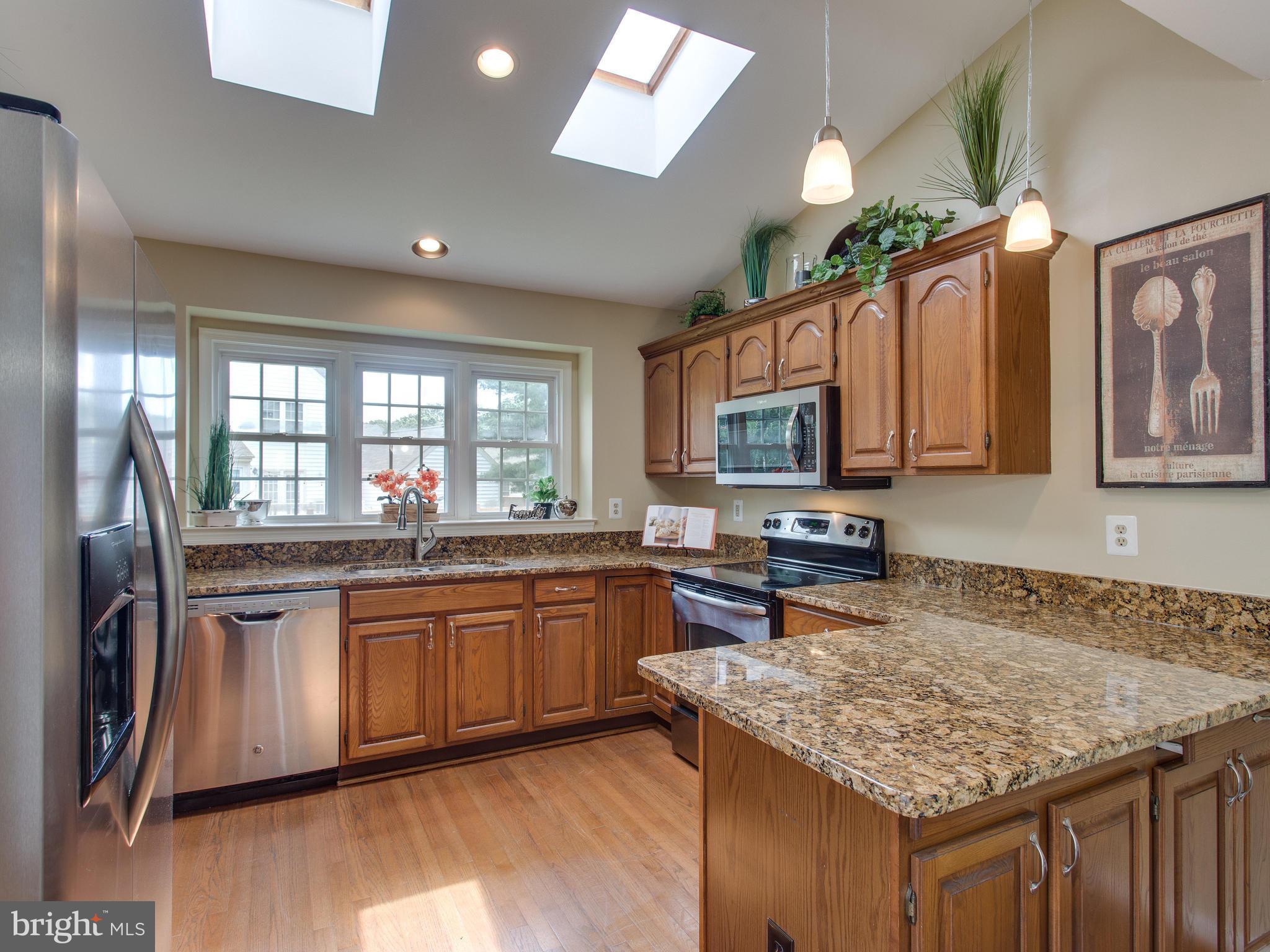 6565 Forsythia Street Springfield, VA 22150 - Photo 11 of 30 Updated Kitchen with Stainless Steel Appliances