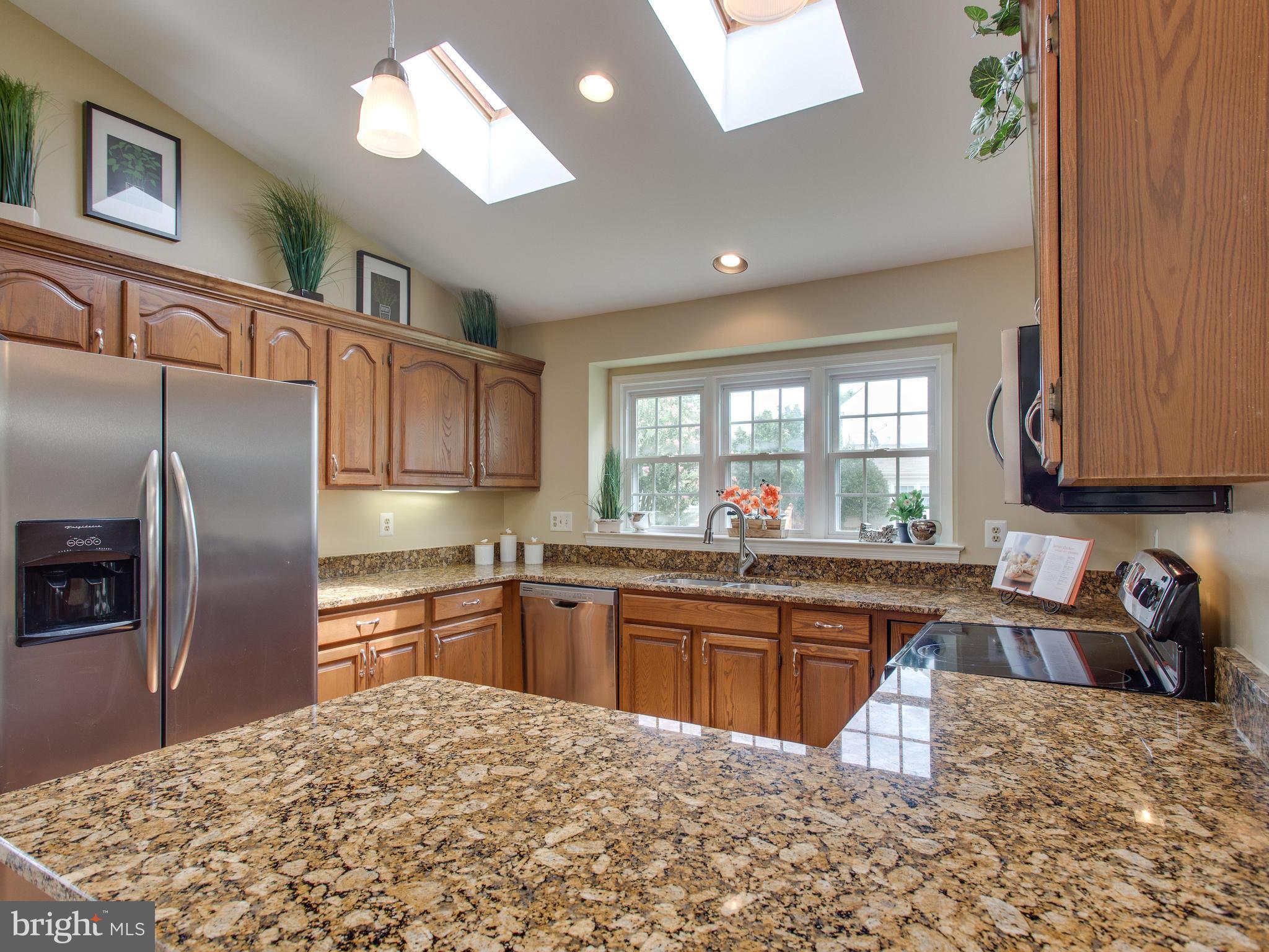 6565 Forsythia Street Springfield, VA 22150 - Photo 12 of 30 Gorgeous Granite Counters and Skylights