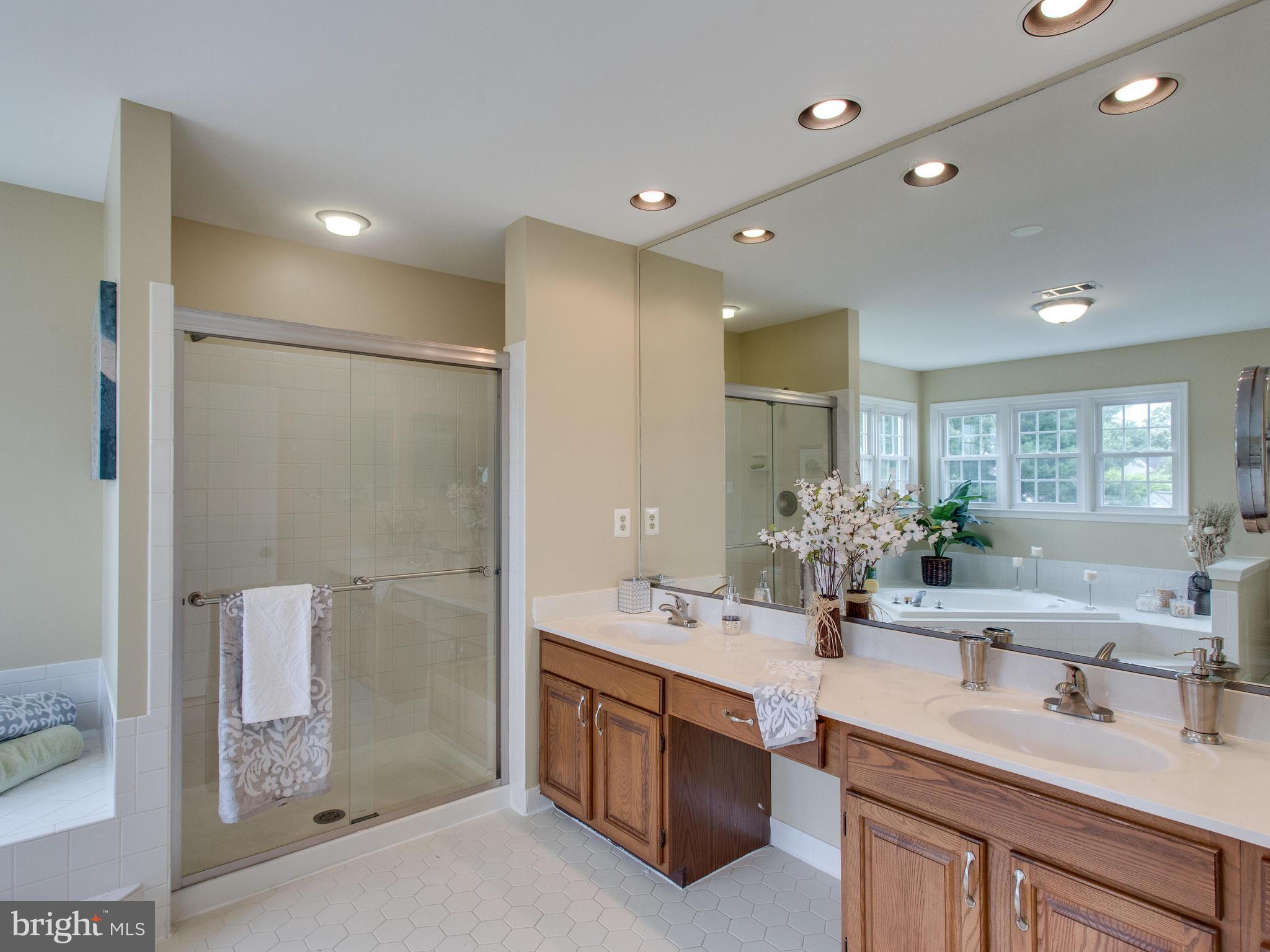 6565 Forsythia Street Springfield, VA 22150 - Photo 17 of 30 Separate Shower and Dual Vanities