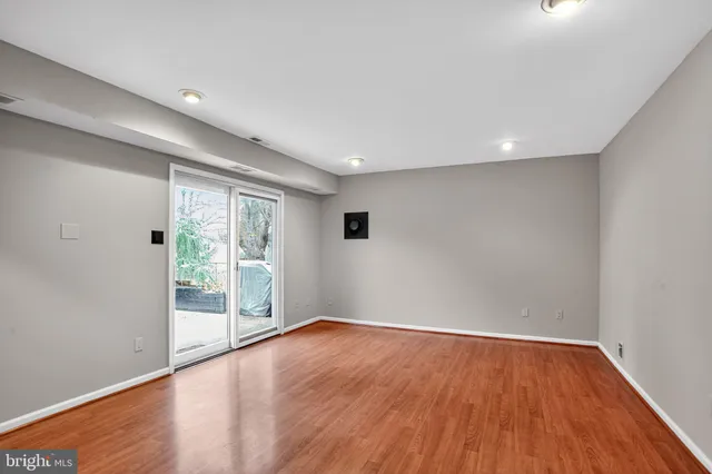 a view of workspace with a window and a ceiling fan