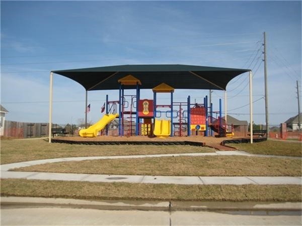 3430 Lilac Ranch Drive Katy, TX 77494 - Photo 27 of 29 a view of a swimming pool with sitting area