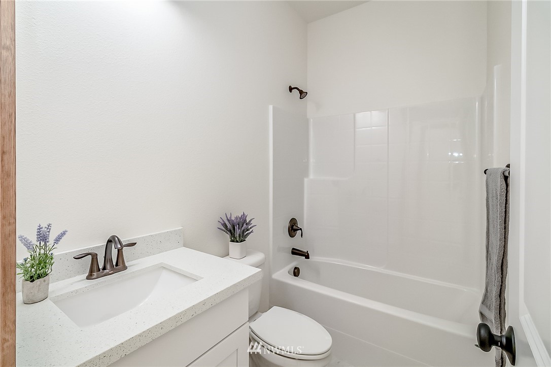 2624 Callow Road, Unit B Lake Stevens, WA 98258 - Photo 25 of 37 a bathroom with a sink toilet and shower