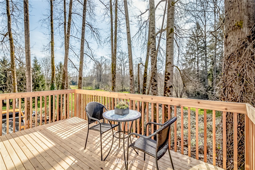 2624 Callow Road, Unit B Lake Stevens, WA 98258 - Photo 29 of 37 a view of balcony with wooden floor and outdoor seating