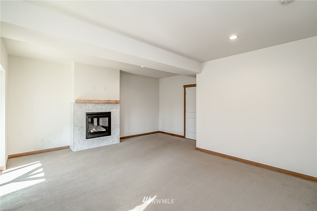 2624 Callow Road, Unit B Lake Stevens, WA 98258 - Photo 32 of 37 a view of an empty room with a fireplace