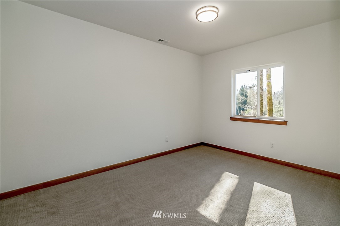 2624 Callow Road, Unit B Lake Stevens, WA 98258 - Photo 34 of 37 an empty room with windows