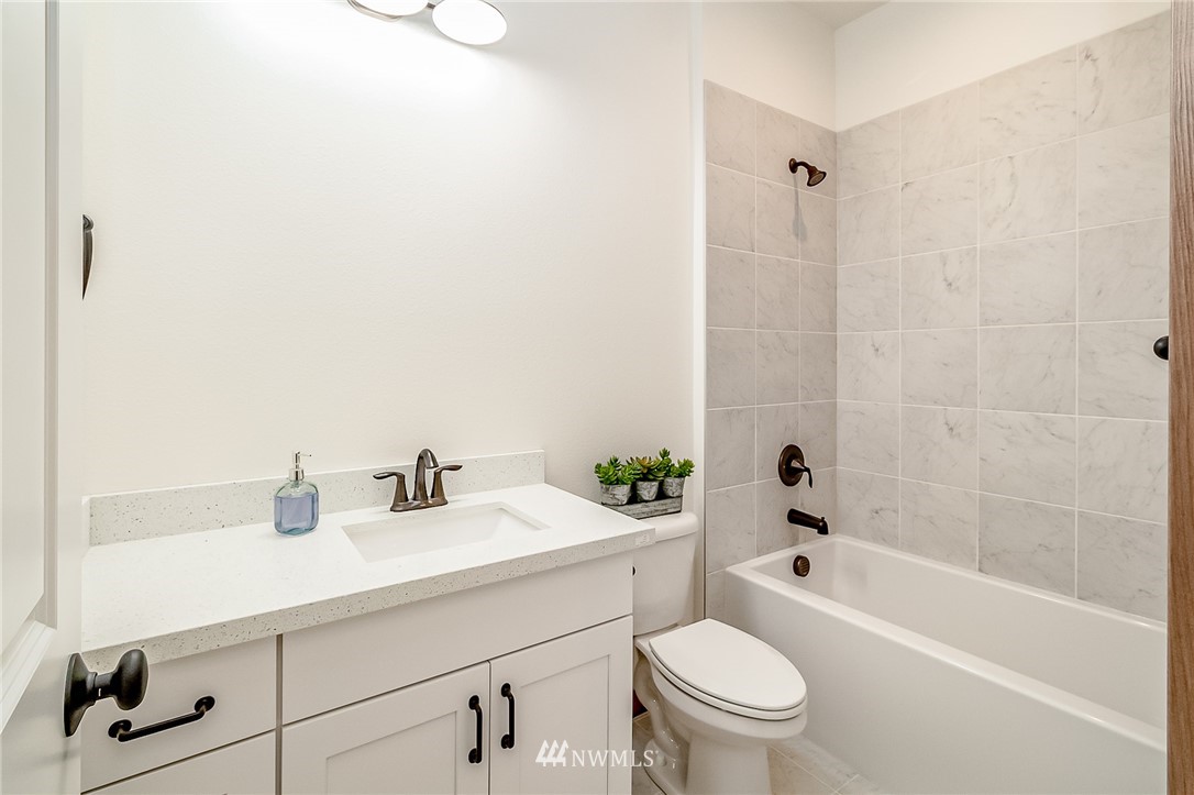 2624 Callow Road, Unit B Lake Stevens, WA 98258 - Photo 8 of 37 a bathroom with a sink a toilet and shower