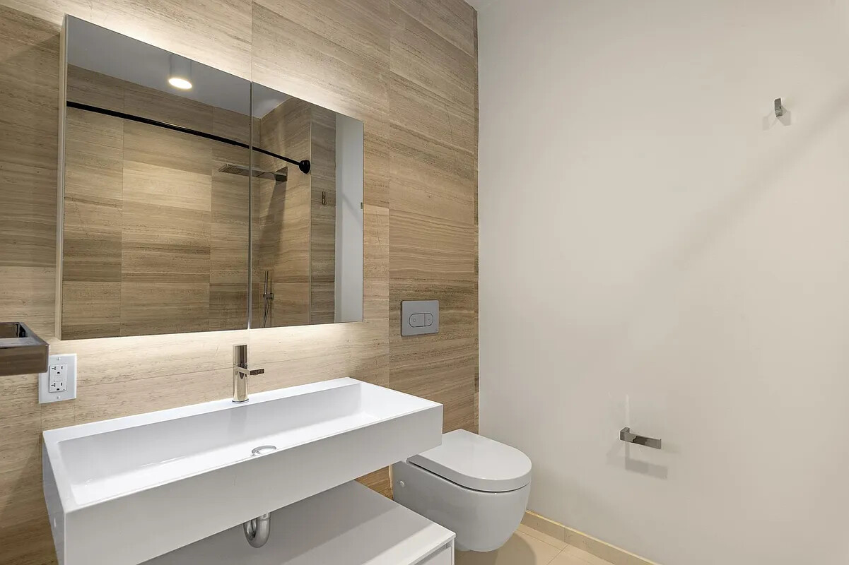 160 Imlay Street, Unit 3B2 Brooklyn, NY 11231 - Photo 10 of 18 a bathroom with a sink a toilet and shower