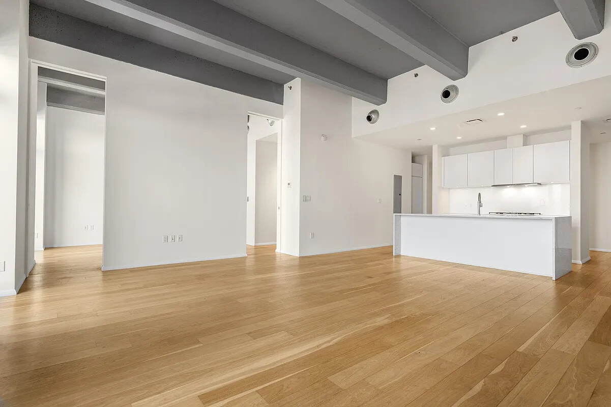 160 Imlay Street, Unit 3B2 Brooklyn, NY 11231 - Photo 14 of 18 a view of kitchen with wooden floor