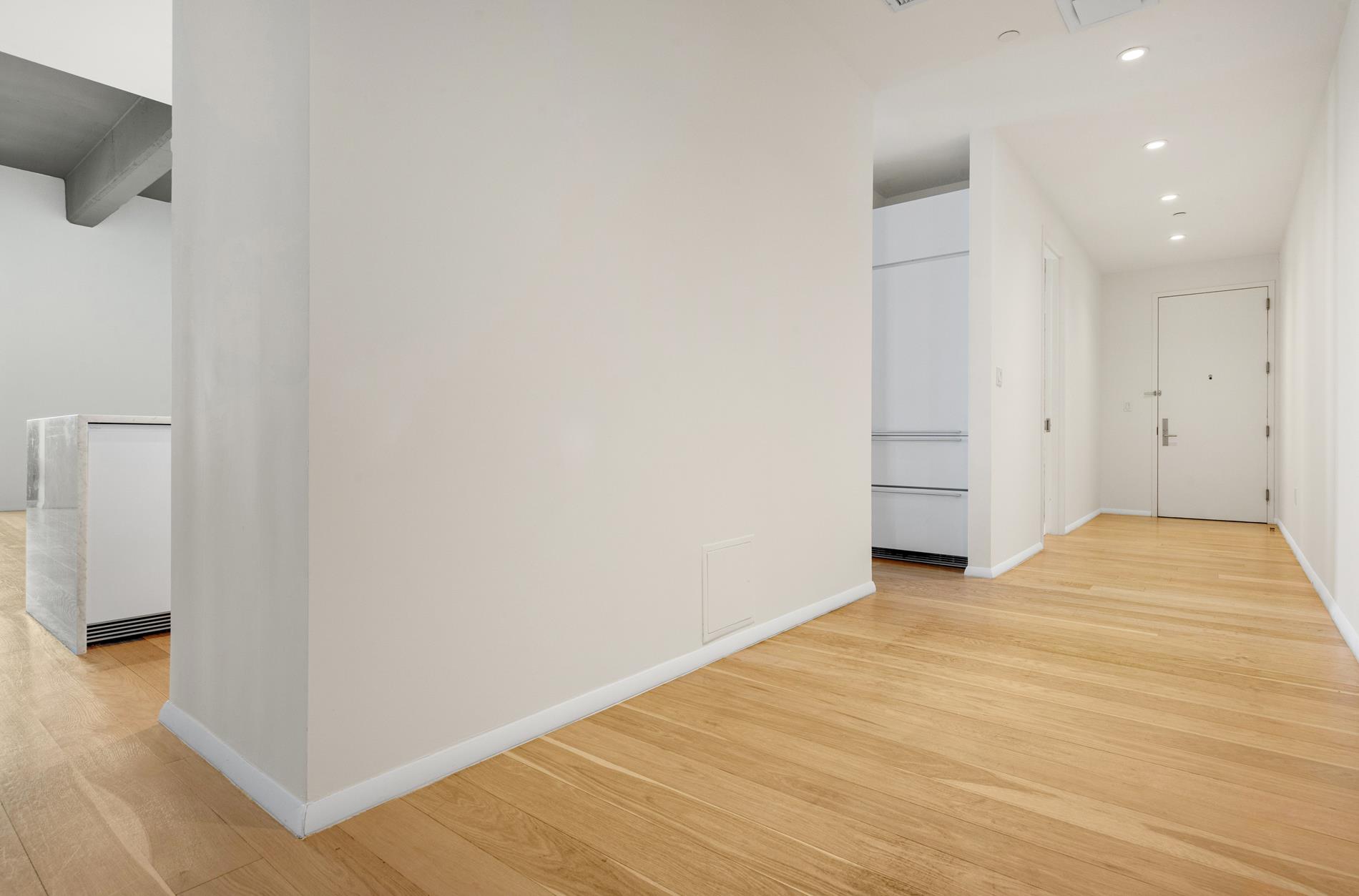 160 Imlay Street, Unit 3B2 Brooklyn, NY 11231 - Photo 6 of 18 a view of empty room with wooden floor