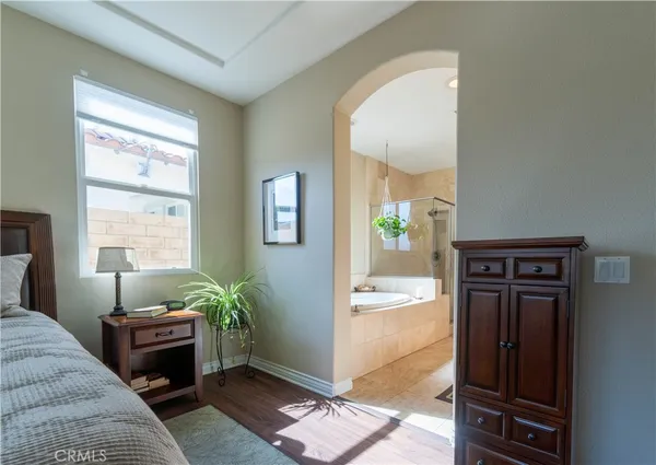 a bathroom with a tub and a shower