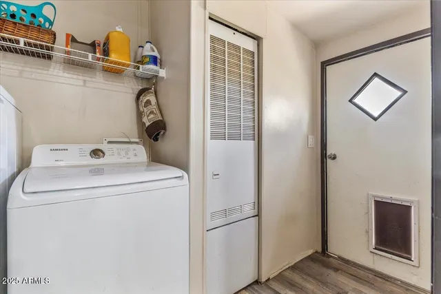 a spacious bathroom with a sink a toilet and shower