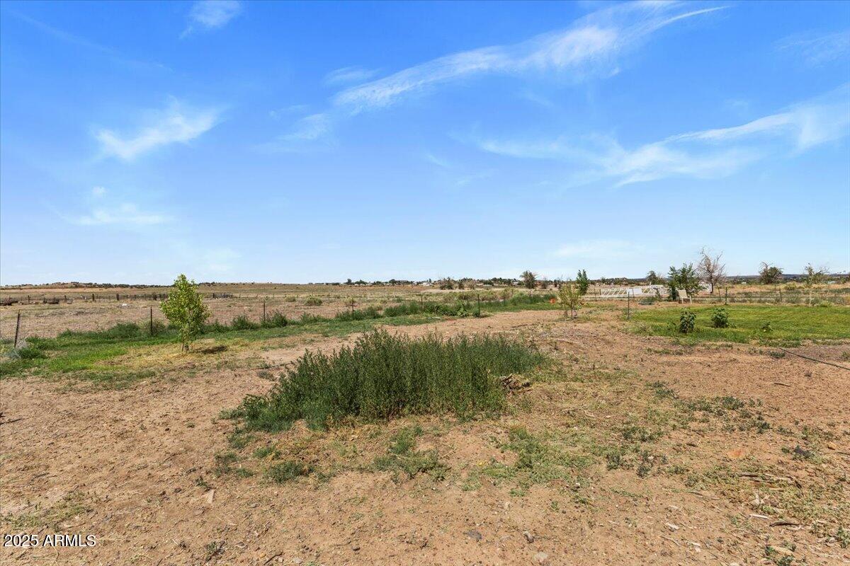 936 Paper Mill Road Taylor, AZ 85939 - Photo 25 of 43 a view of a lake with a yard