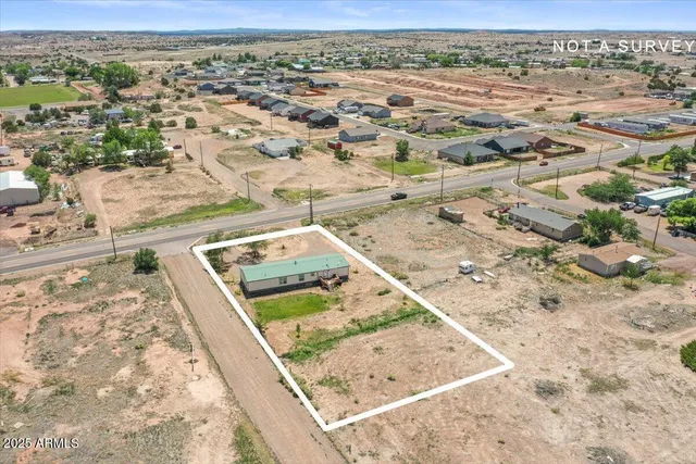 a view of a yard with wooden floor