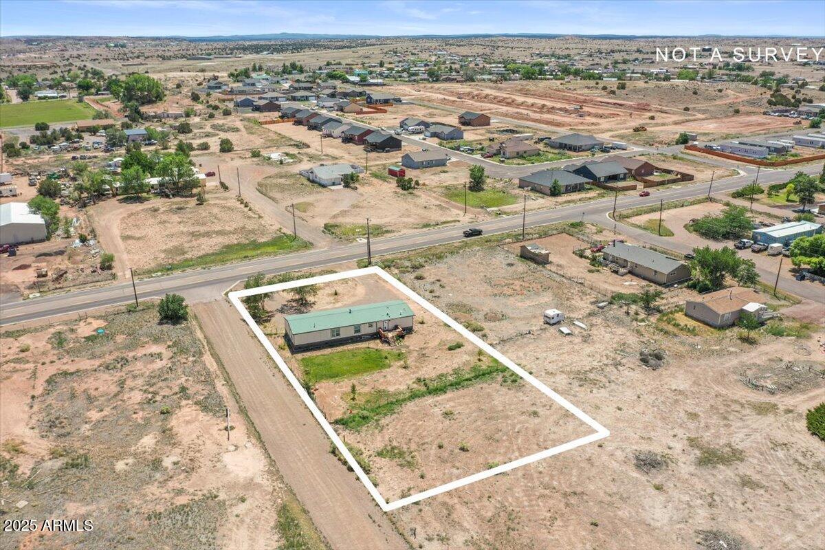 936 Paper Mill Road Taylor, AZ 85939 - Photo 35 of 43 a view of a yard with wooden floor