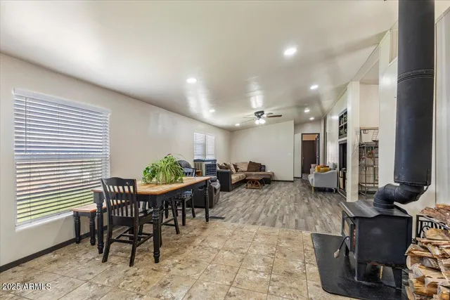 a kitchen with a table and chairs in it