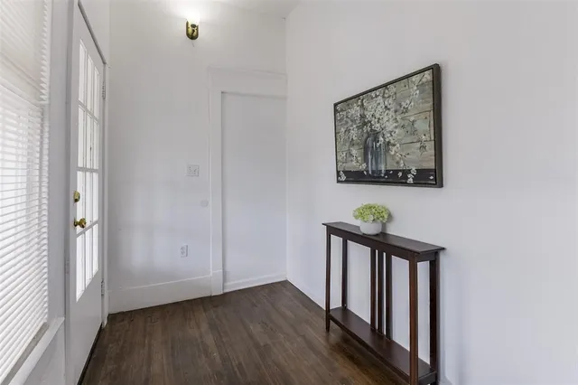 a view of entryway with wooden floor