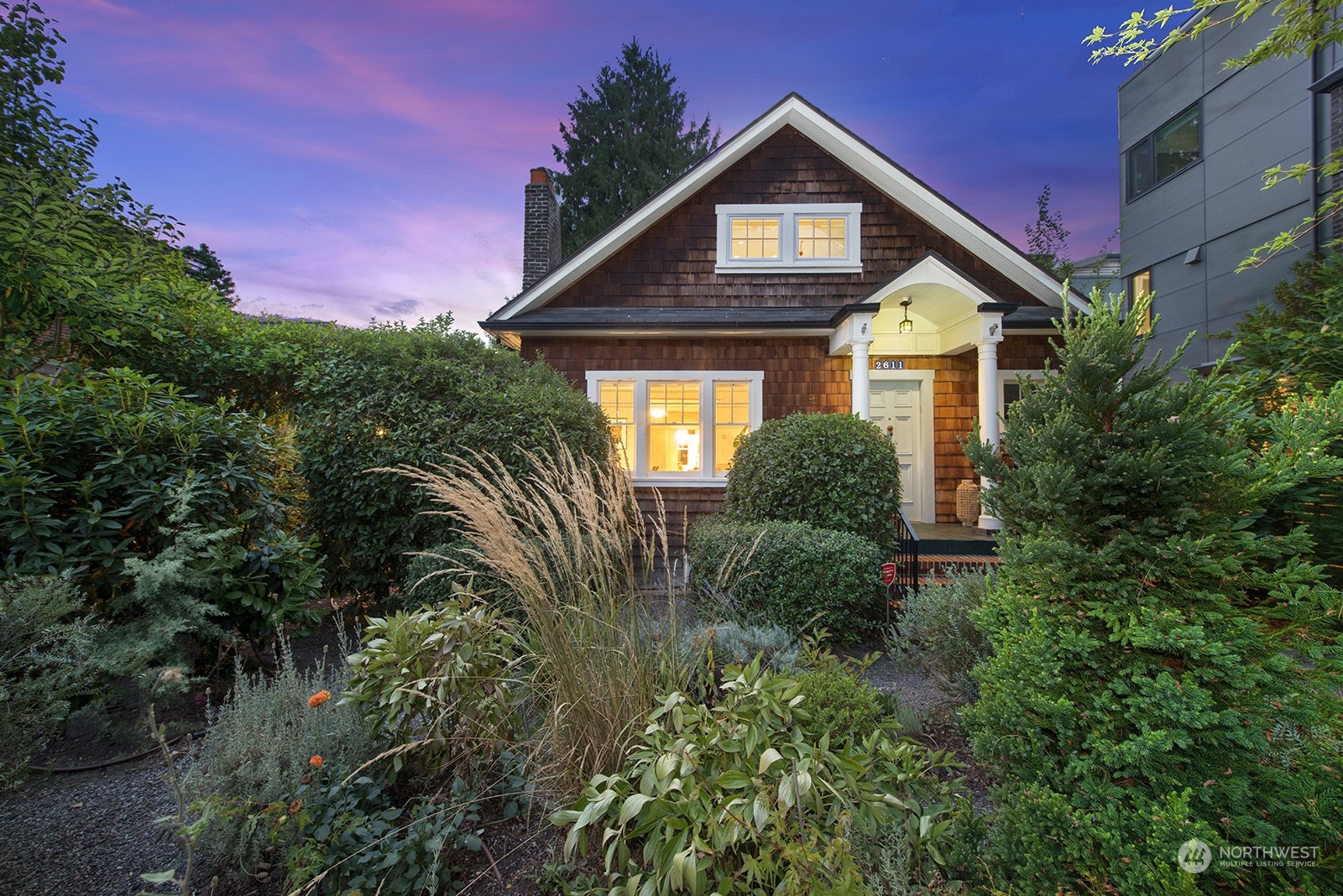 2611 Franklin Avenue East Seattle, WA 98102 - Photo 1 of 40 a front view of a house with a yard