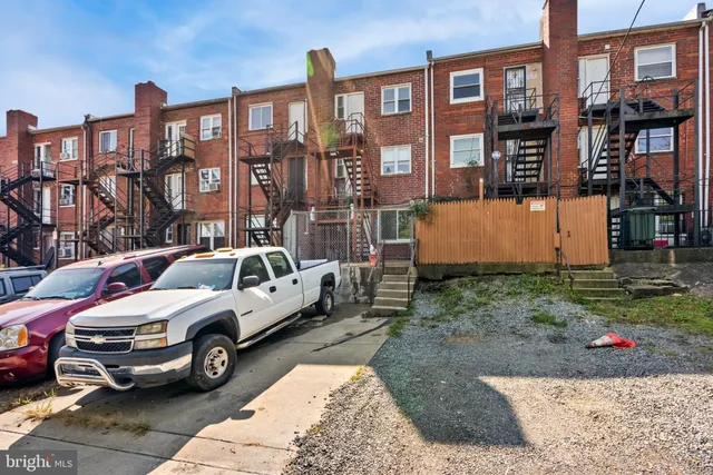 a view of the kitchen with a sink