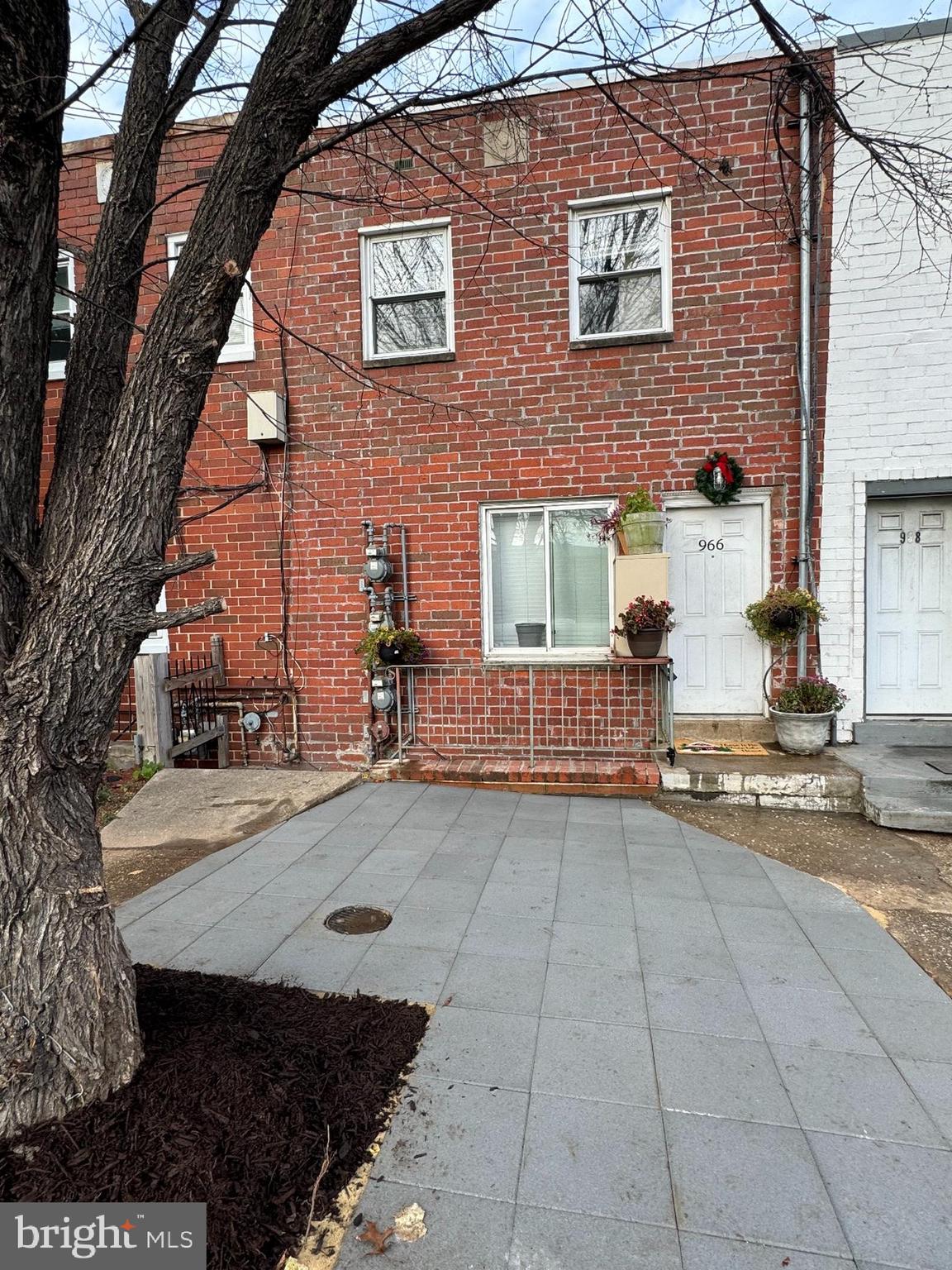 966 Mt Olivet Road Northeast Washington, DC 20002 - Photo 19 of 21 a view of a house with brick walls