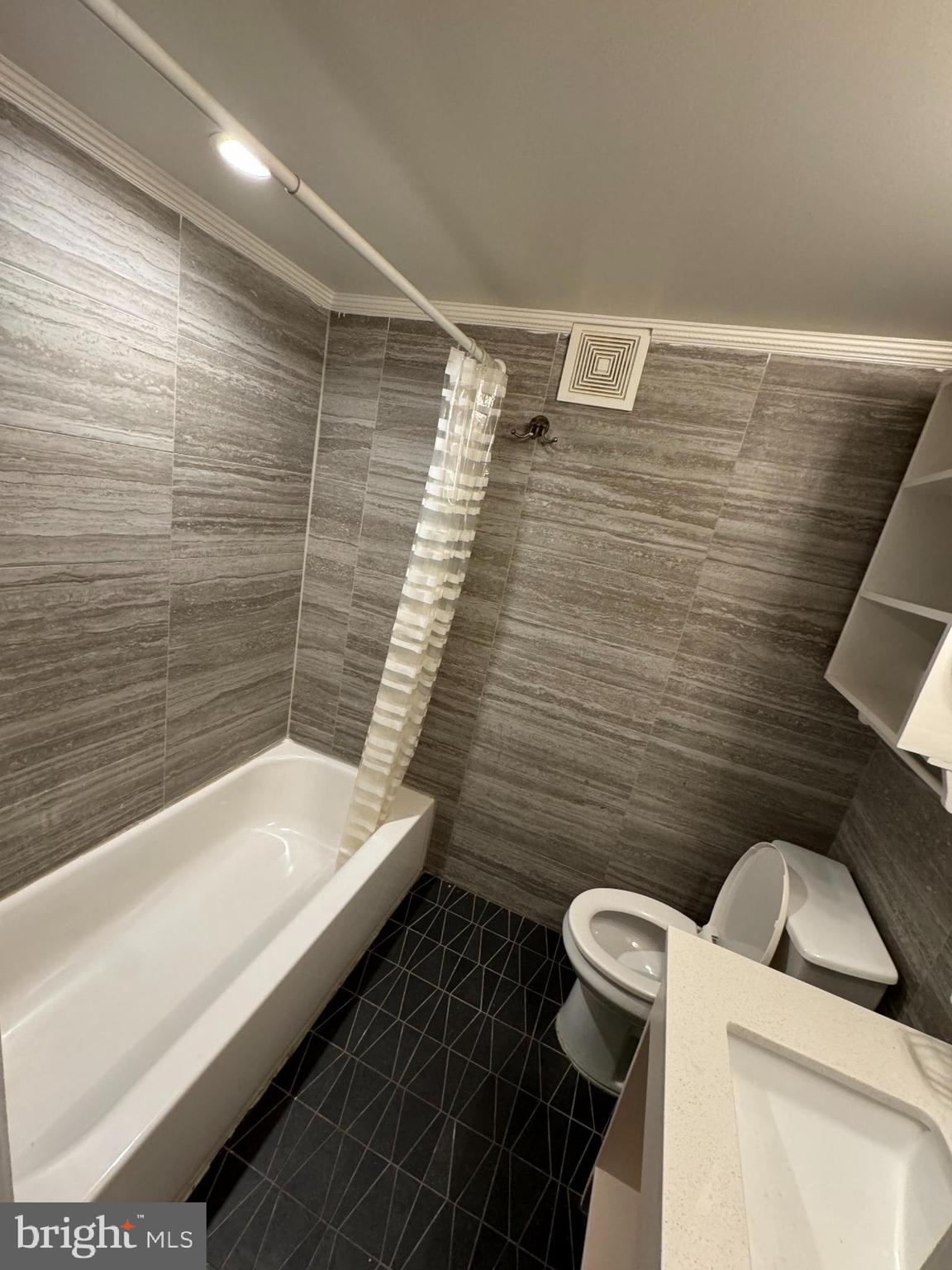 966 Mt Olivet Road Northeast Washington, DC 20002 - Photo 21 of 21 a bathroom with a toilet and a sink