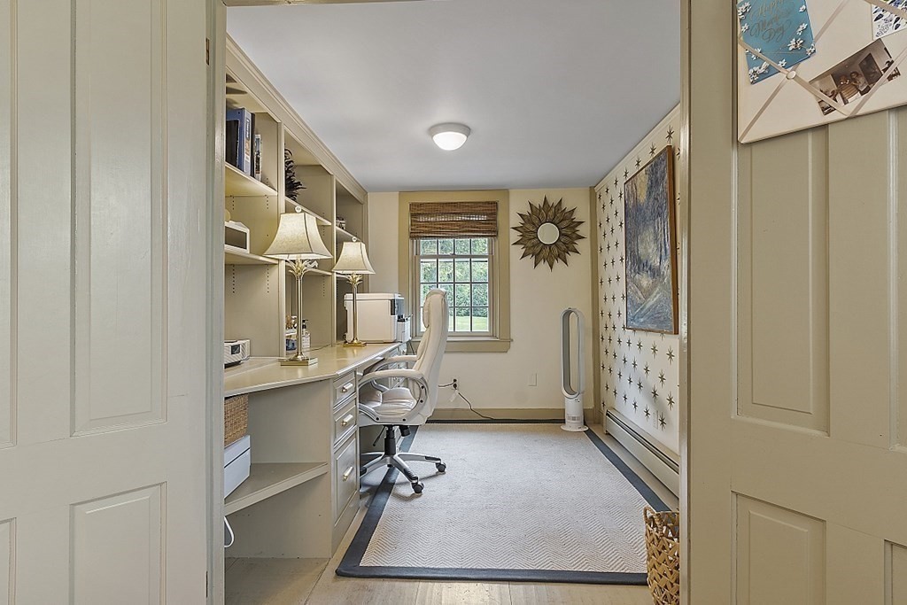 228 Main Street Groton, MA 01450 - Photo 16 of 35 a view of a entryway with furniture and windows