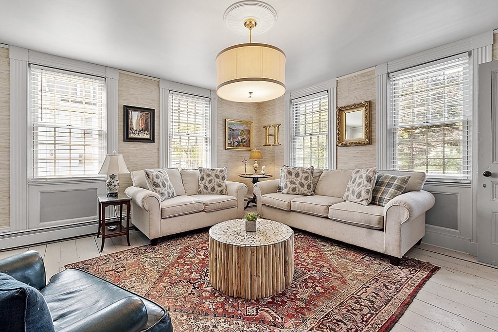 228 Main Street Groton, MA 01450 - Photo 20 of 35 a living room with furniture and a large window