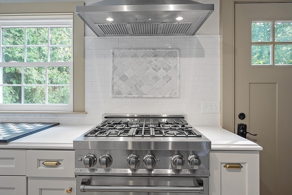 228 Main Street Groton, MA 01450 - Photo 7 of 35 a stove top oven sitting inside of a kitchen
