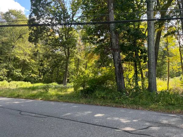 a view of street from balcony