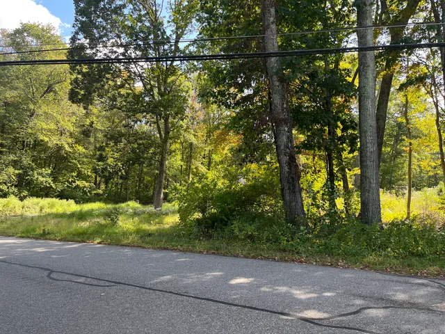 a view of street from balcony