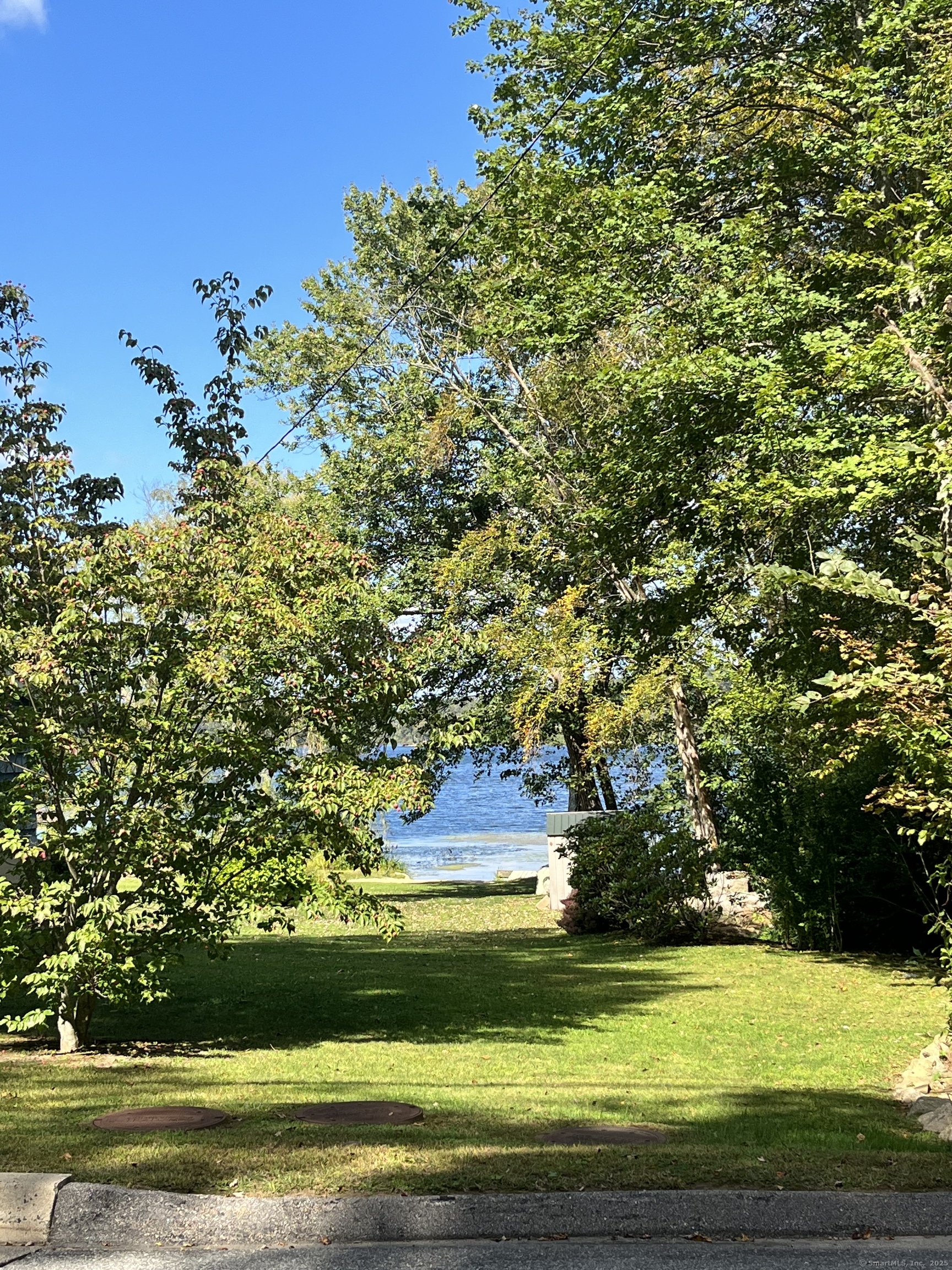 282 Deepwood Drive Hebron, CT 06231 - Photo 6 of 13 a view of yard with swimming pool and green space