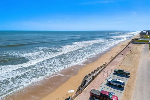 a view of a city with an ocean