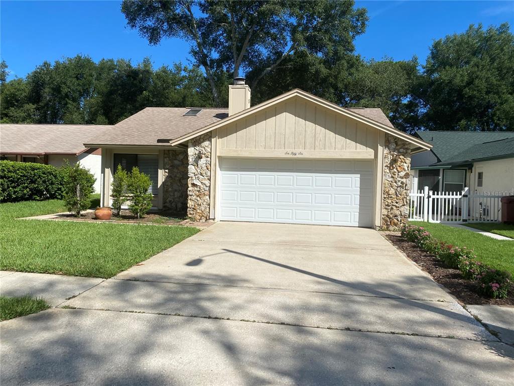 656 Boniview Lane Altamonte Springs, FL 32714 - Photo 1 of 17 a front view of a house with a yard