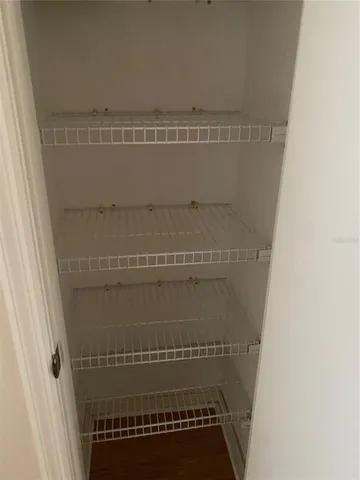 a view of a room with racks on the wall