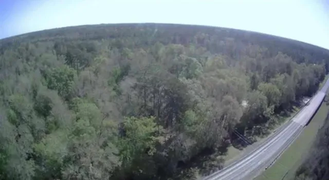 a street sign sitting on top of a road