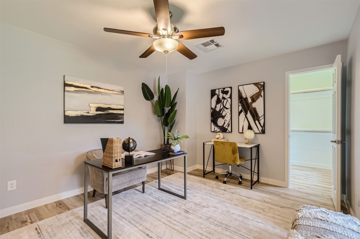 12306 Double Tree Lane Austin, TX 78750 - Photo 12 of 38 a living room with furniture and a potted plant