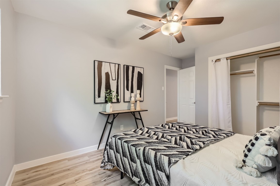 12306 Double Tree Lane Austin, TX 78750 - Photo 21 of 38 a bedroom with bed and a window